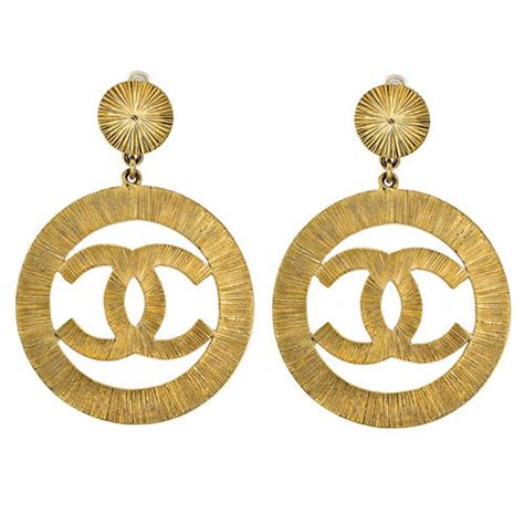 chanel paris cc logo gold pearl dangle earrings|Chanel eternal no 5 earrings.